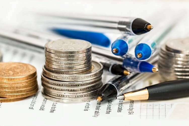 coin stack with pens