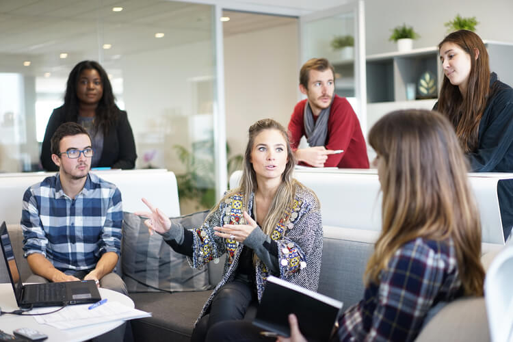 people talking in office